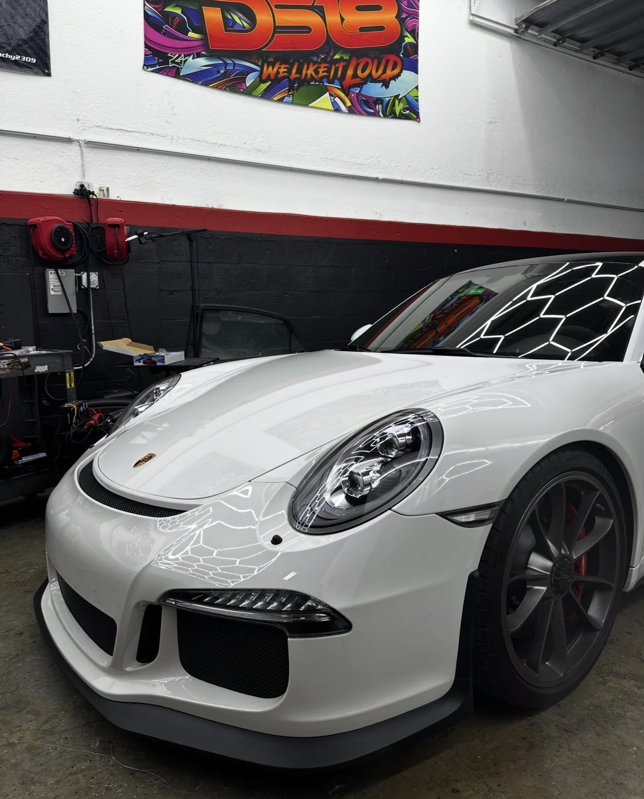 White Porsche in the workshop